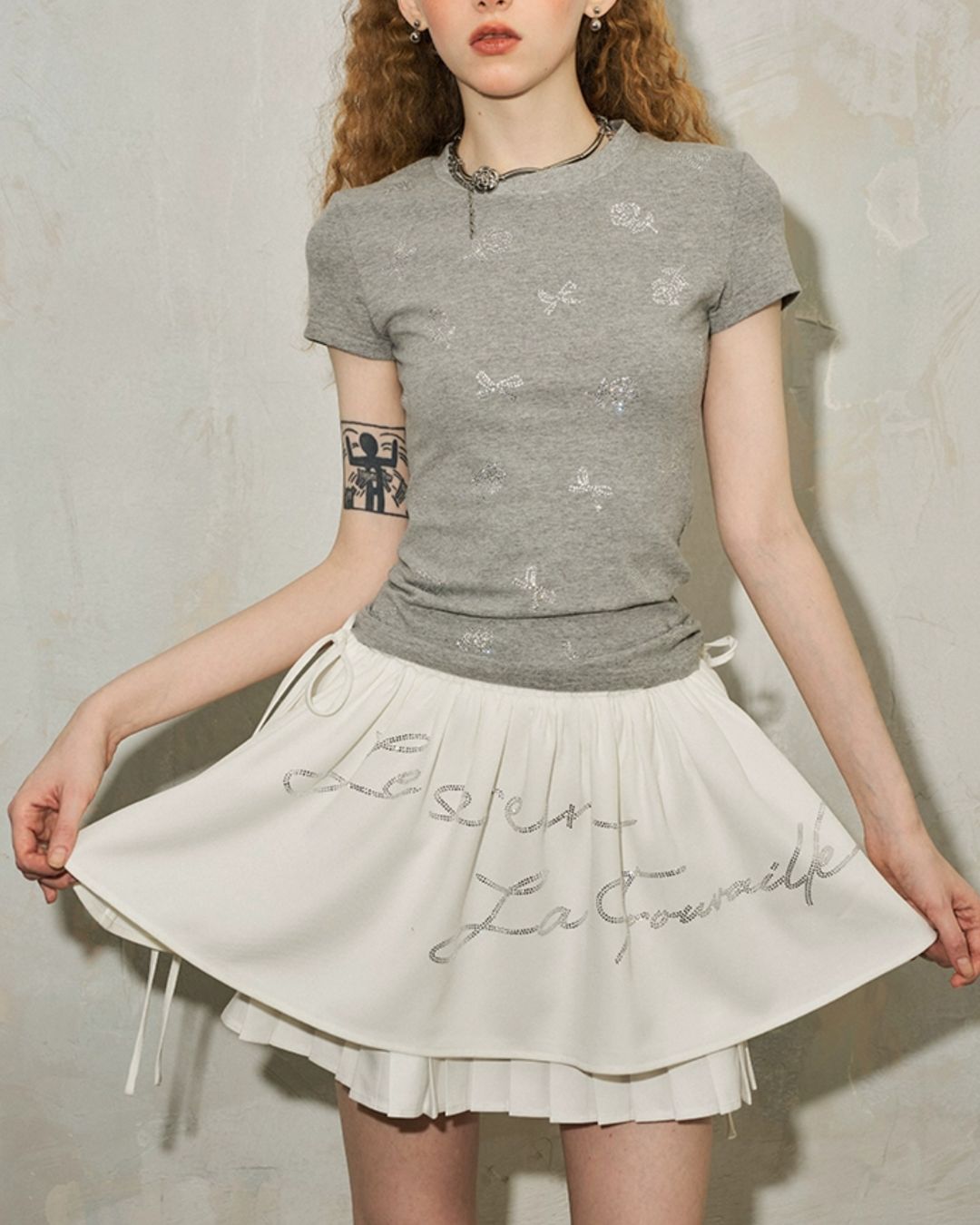 Rhinestone Logo Pleated Mini Skirt　BT026